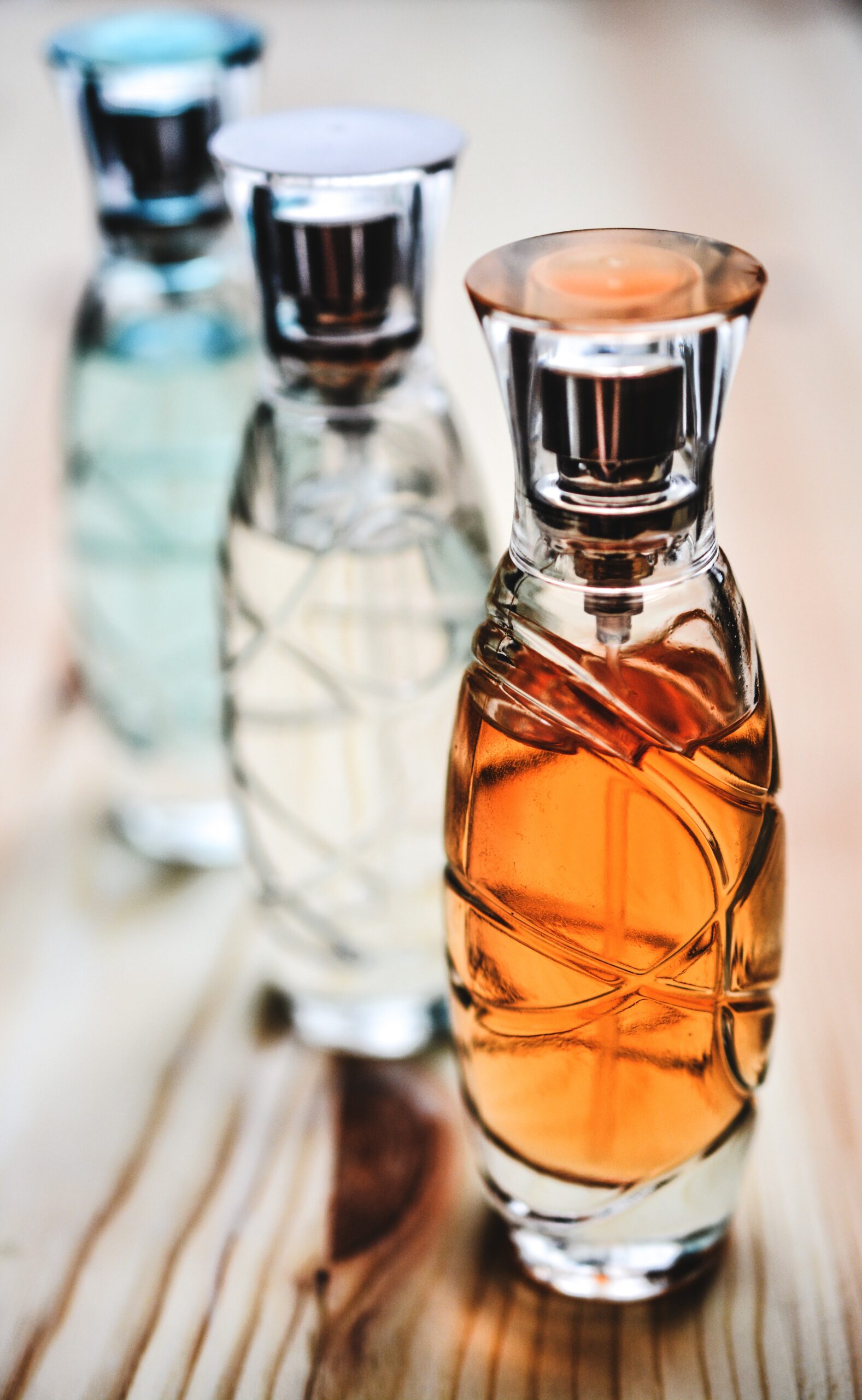 5 Manly Essential Oils – and 5 Not So Manly Ones. three perfume bottles