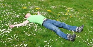 Man asleep in field