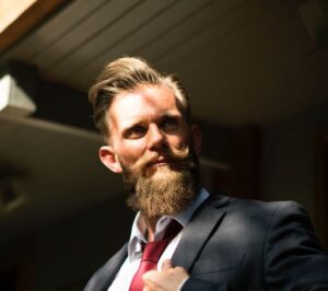 Man with oily beard
