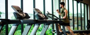 Natural Insomnia Remedies for Men - man on treadmill